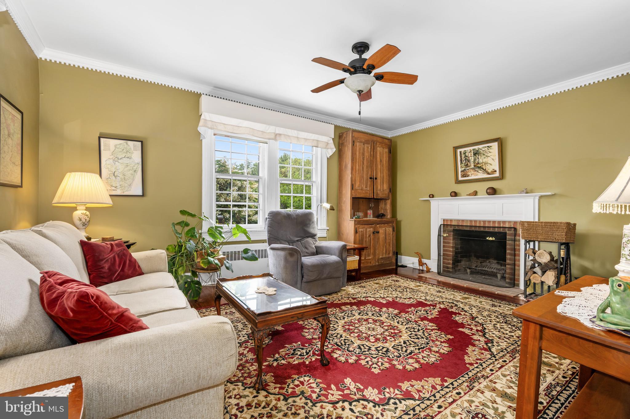 13699 Still Pond Road Still Pond, MD 21667 - Photo 25 of 55 a living room with furniture and a fireplace