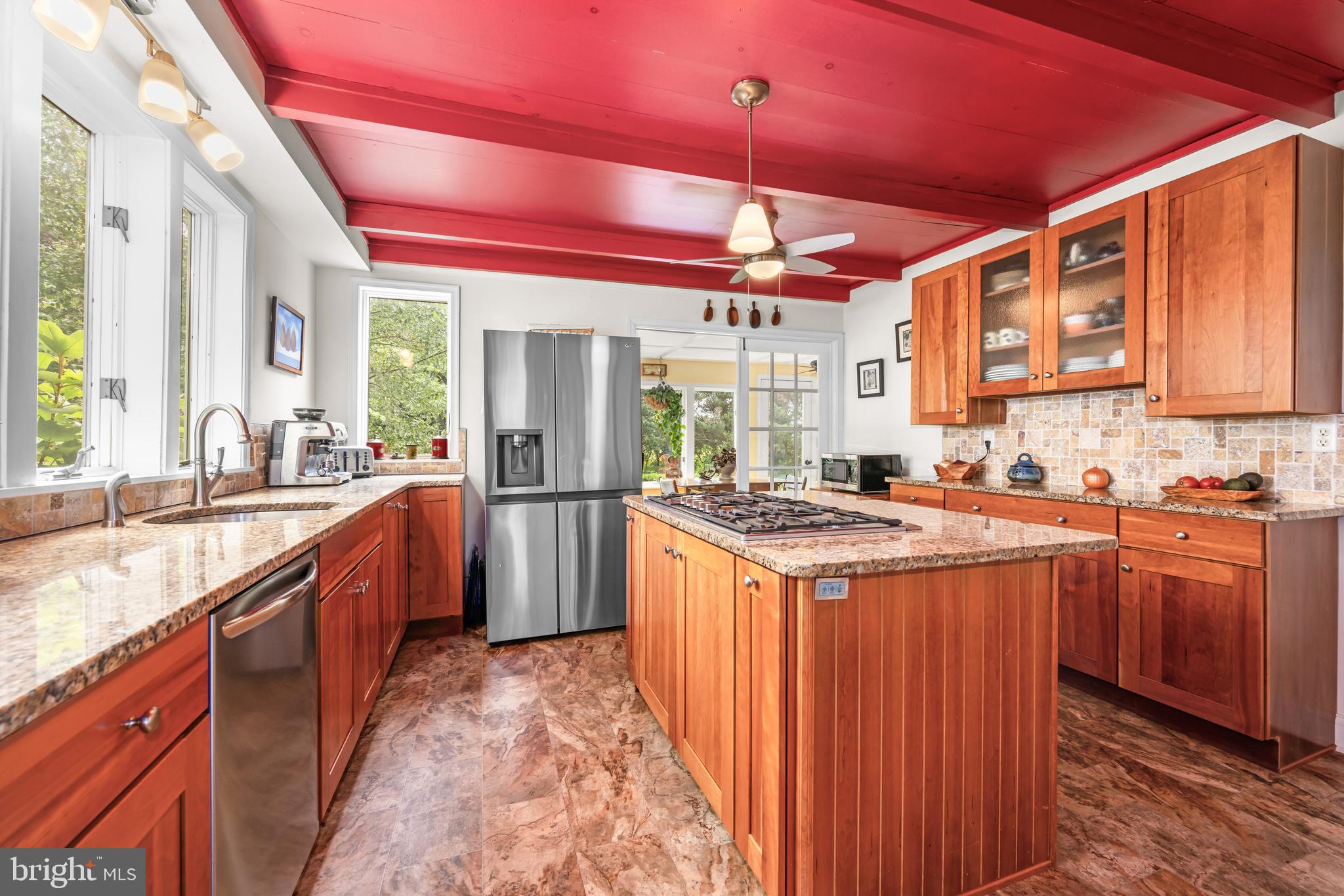 13699 Still Pond Road Still Pond, MD 21667 - Photo 30 of 55 a kitchen with stainless steel appliances granite countertop a sink and a stove