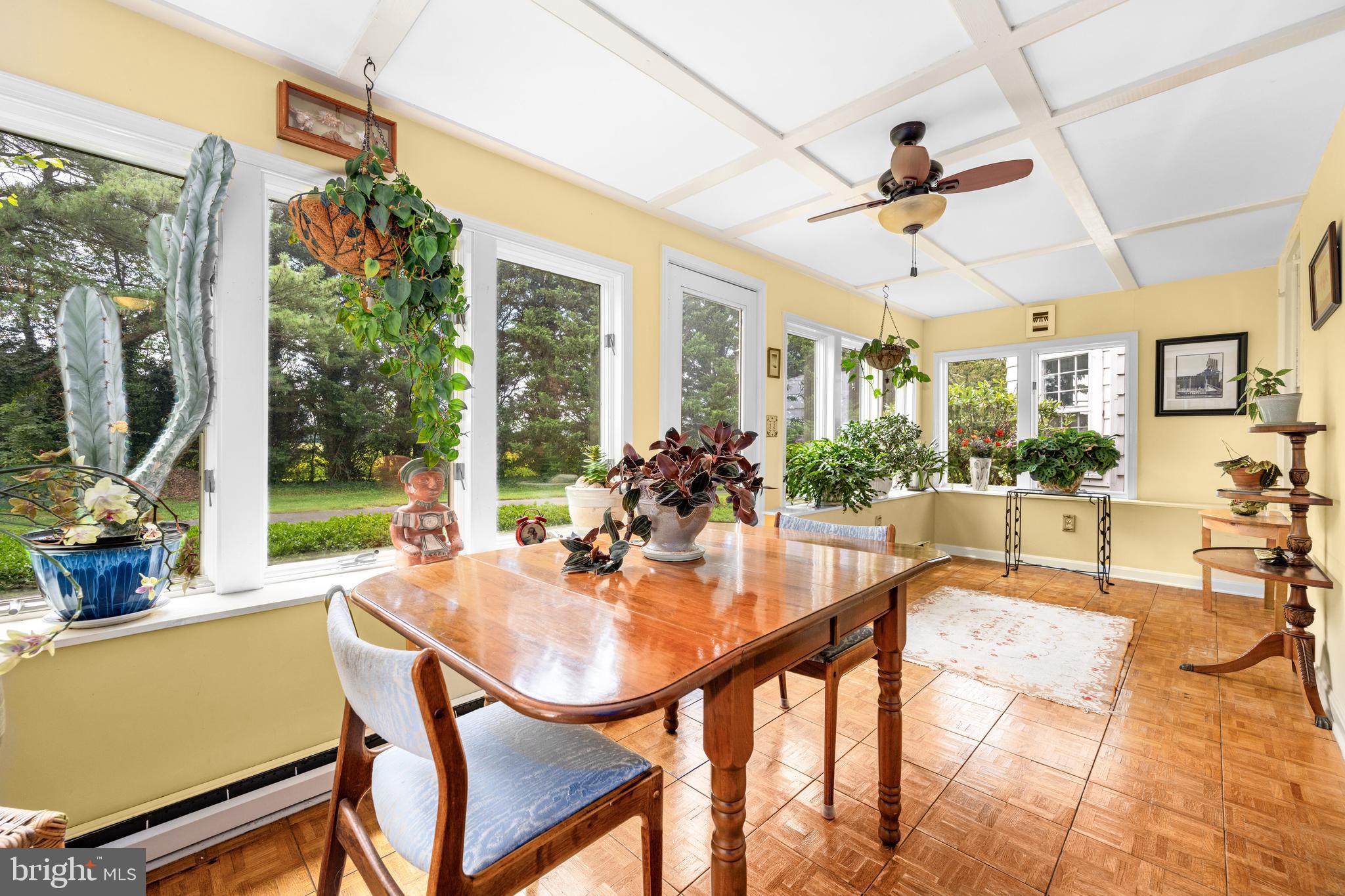 13699 Still Pond Road Still Pond, MD 21667 - Photo 32 of 55 a dining room with furniture a chandelier and a rug