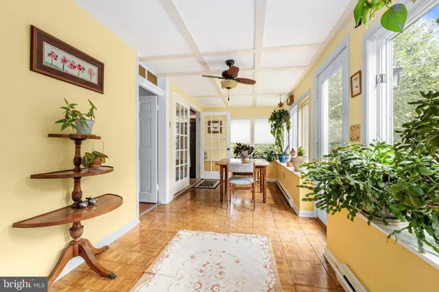 a view of a hallway with windows