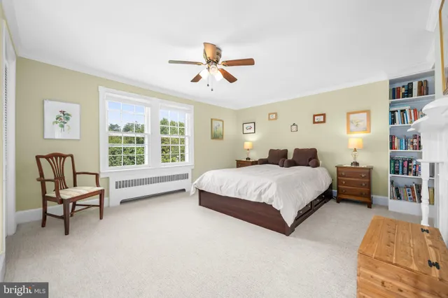 a en suite bathroom with a sink and a mirror