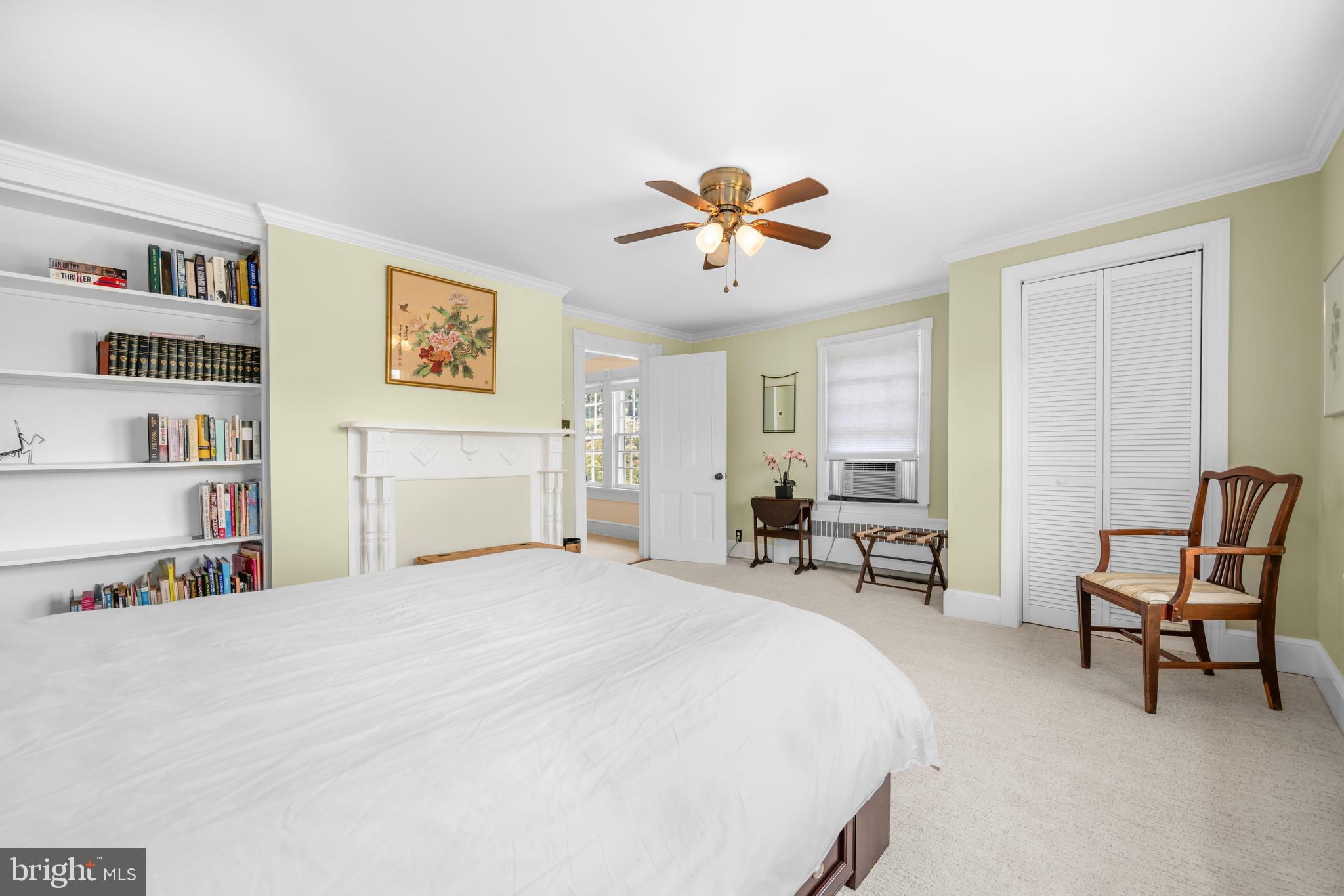 13699 Still Pond Road Still Pond, MD 21667 - Photo 44 of 55 a bedroom with a bed a table and chair