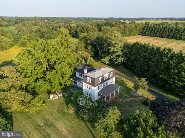 a view of a lake with a building in the background