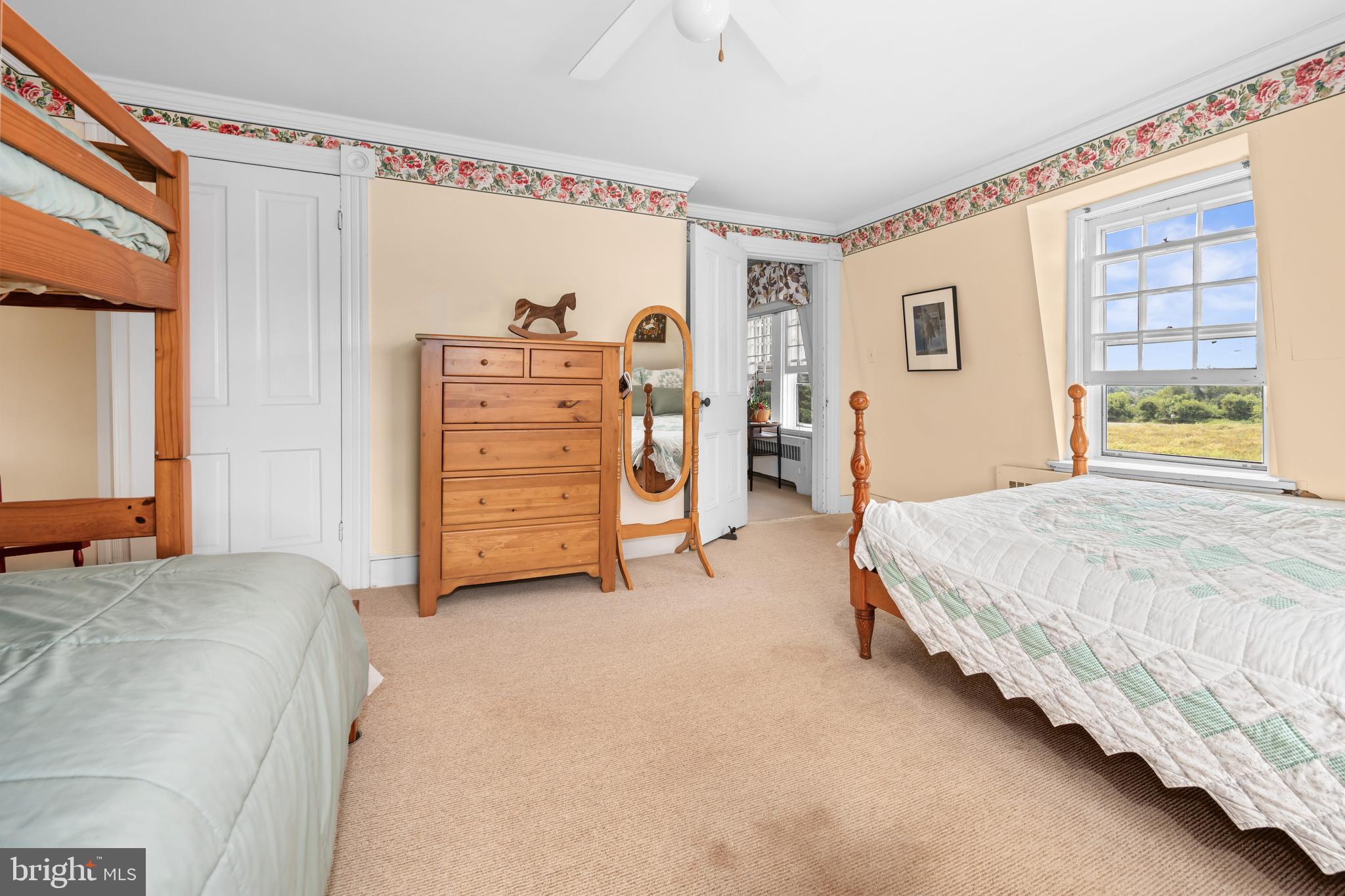 13699 Still Pond Road Still Pond, MD 21667 - Photo 51 of 55 a spacious bedroom with a bed and a cabinets
