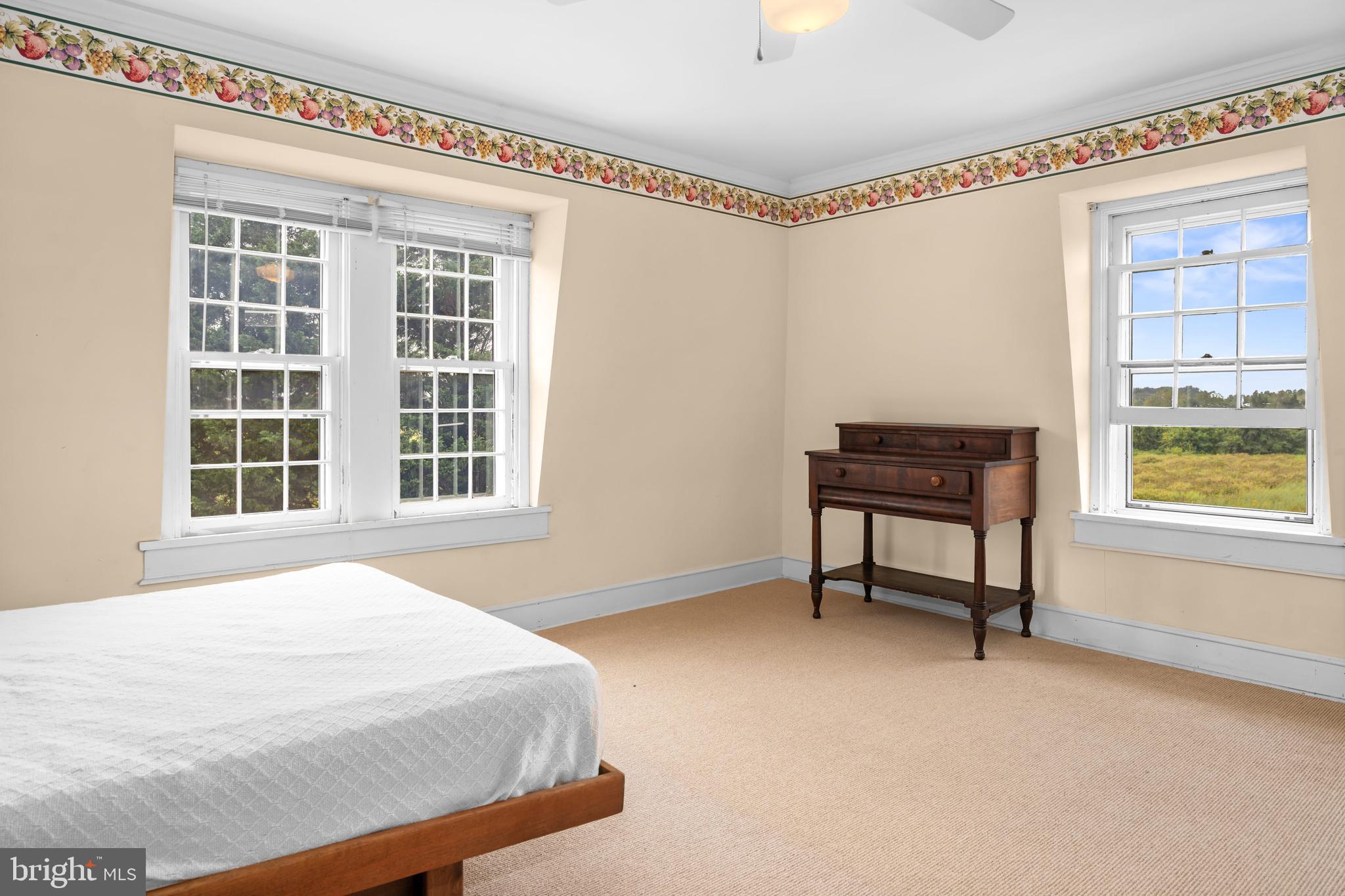 13699 Still Pond Road Still Pond, MD 21667 - Photo 52 of 55 a bedroom with a bed and a window