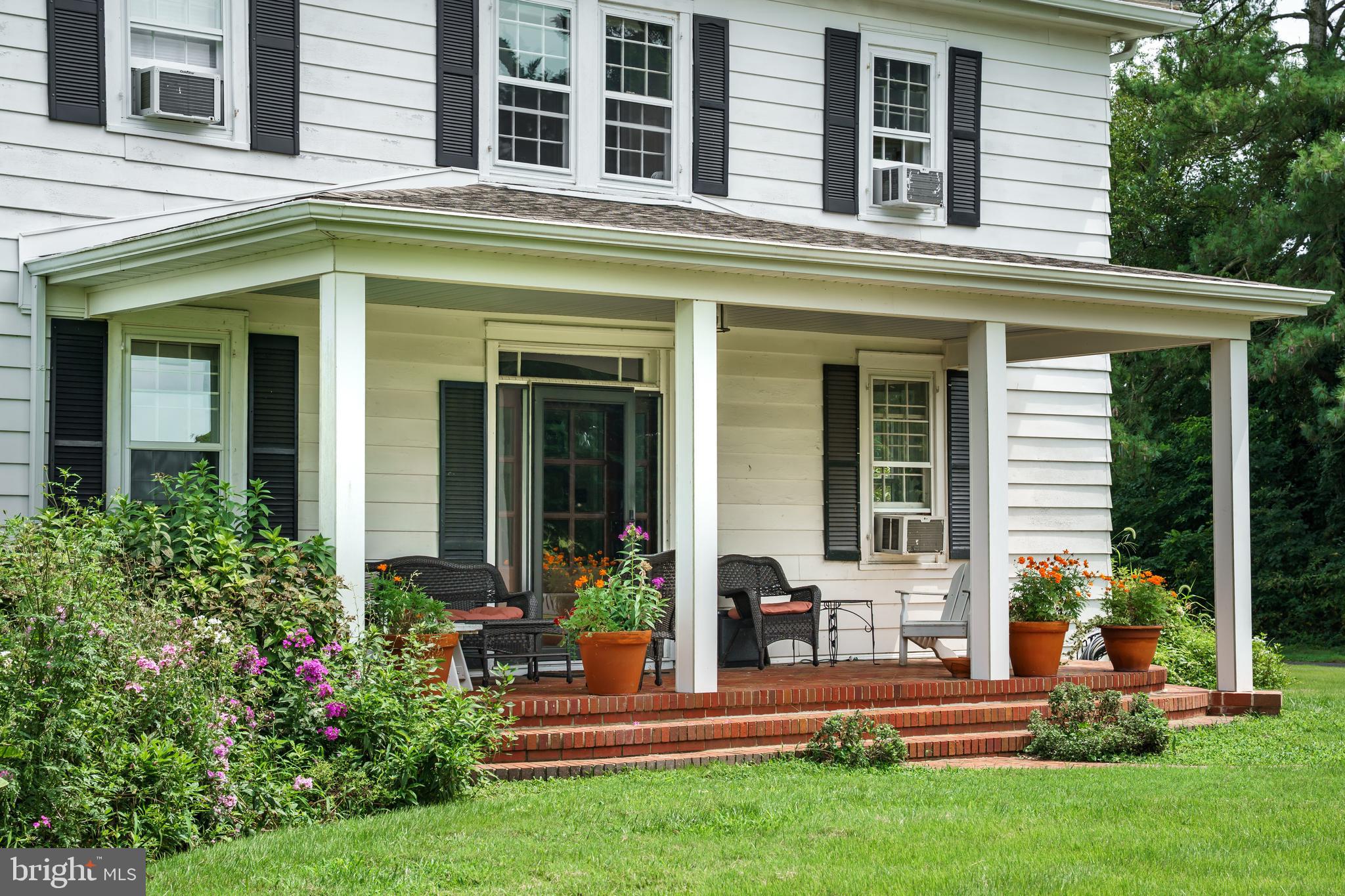 13699 Still Pond Road Still Pond, MD 21667 - Photo 9 of 55 front view of a house with a yard