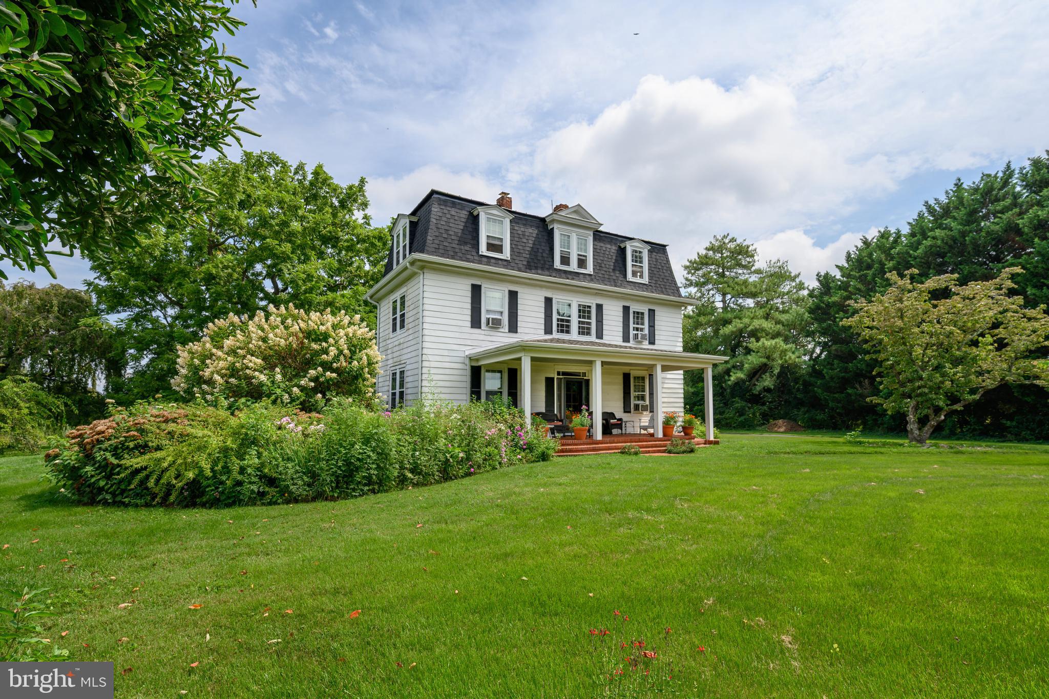 13699 Still Pond Road Still Pond, MD 21667 - Photo 10 of 55 a view of a house with a big yard plants and large trees