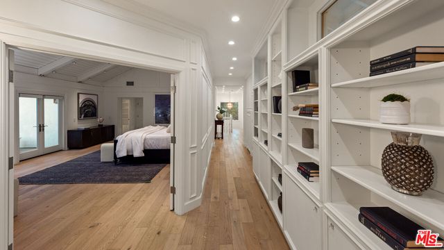 a view of a chairs and table in the balcony