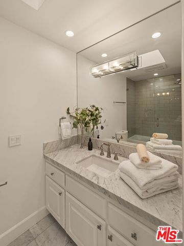 a view of a town with trees and houses