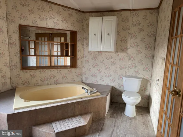 a bathroom with a sink and a bathtub