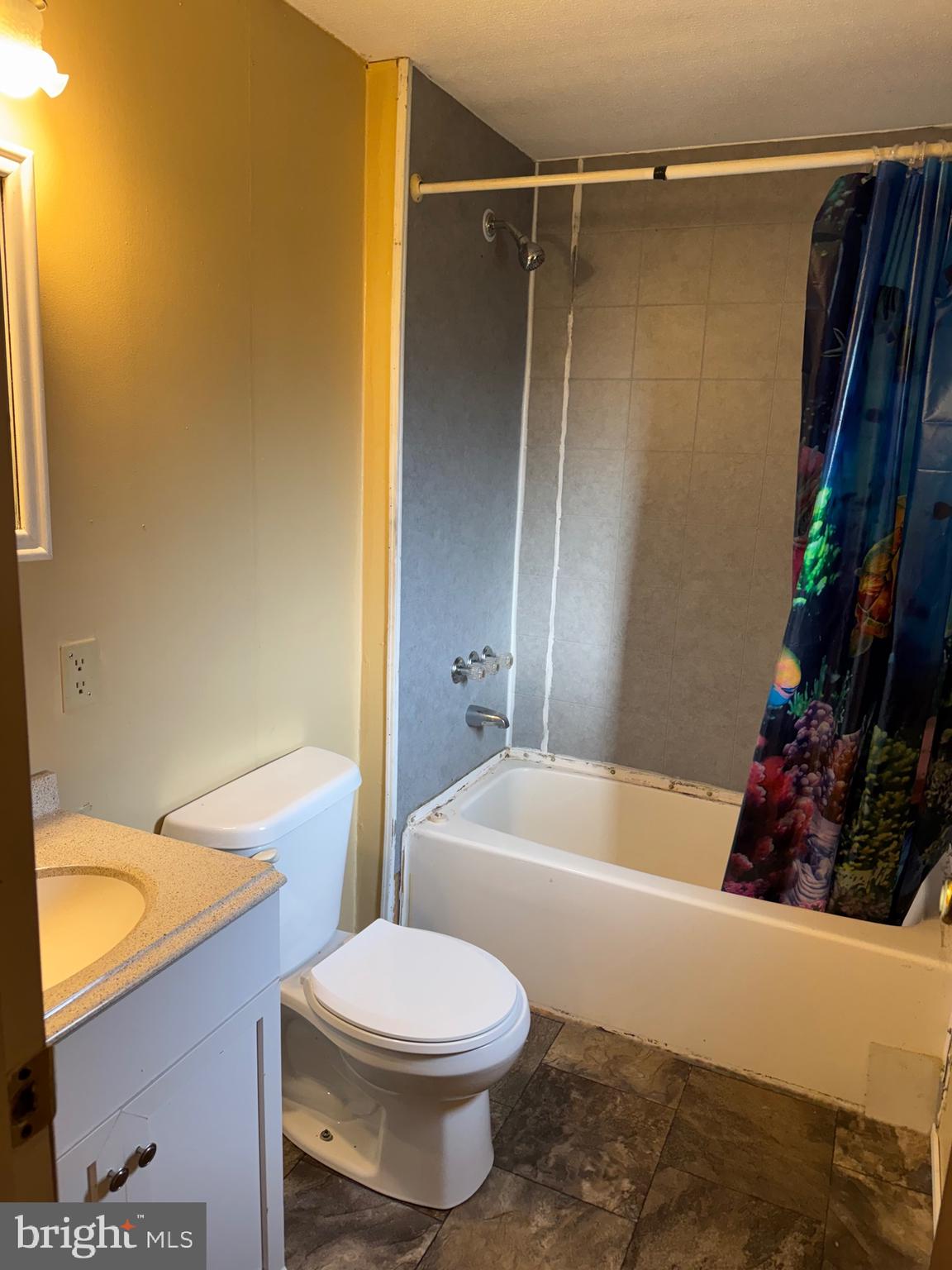 25 Hopkins Mill Road, Unit 23 New Providence, PA 17560 - Photo 10 of 13 a bathroom with a sink a toilet and a bathtub