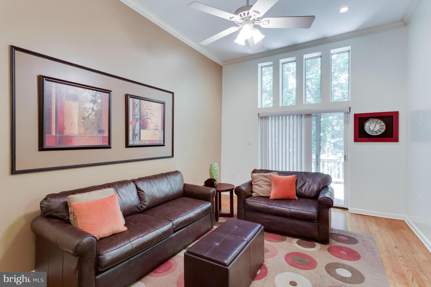 1547 Inlet Court Reston, VA 20190 - Photo 14 of 30 a living room with furniture and a window