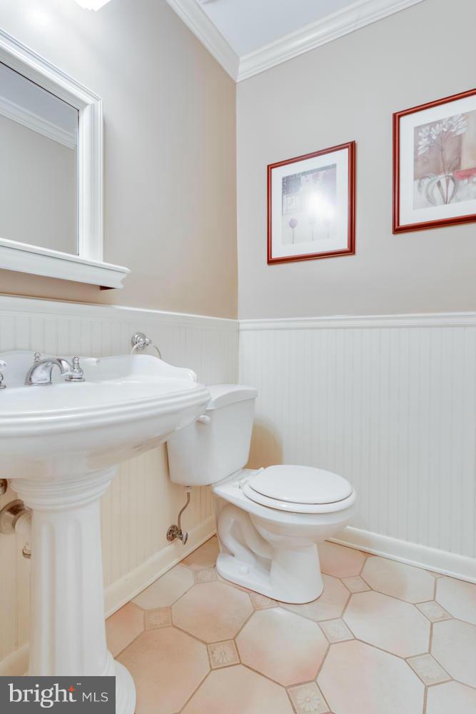 1547 Inlet Court Reston, VA 20190 - Photo 15 of 30 a bathroom with a sink mirror and toilet
