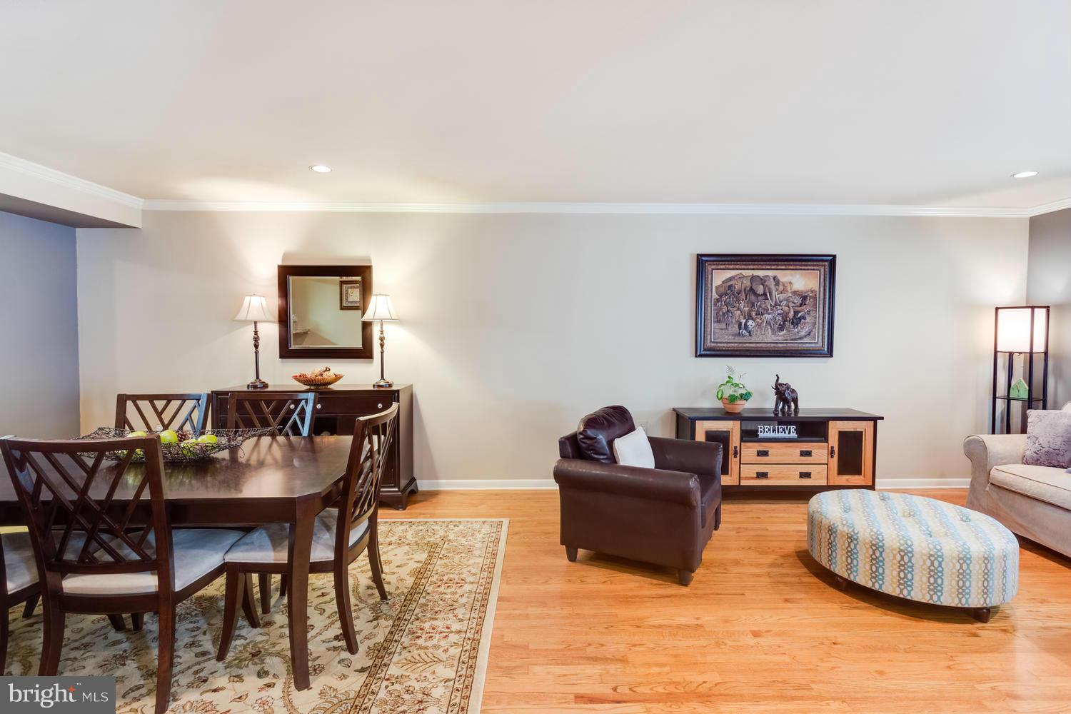 1547 Inlet Court Reston, VA 20190 - Photo 4 of 30 a living room with furniture and a wooden floor