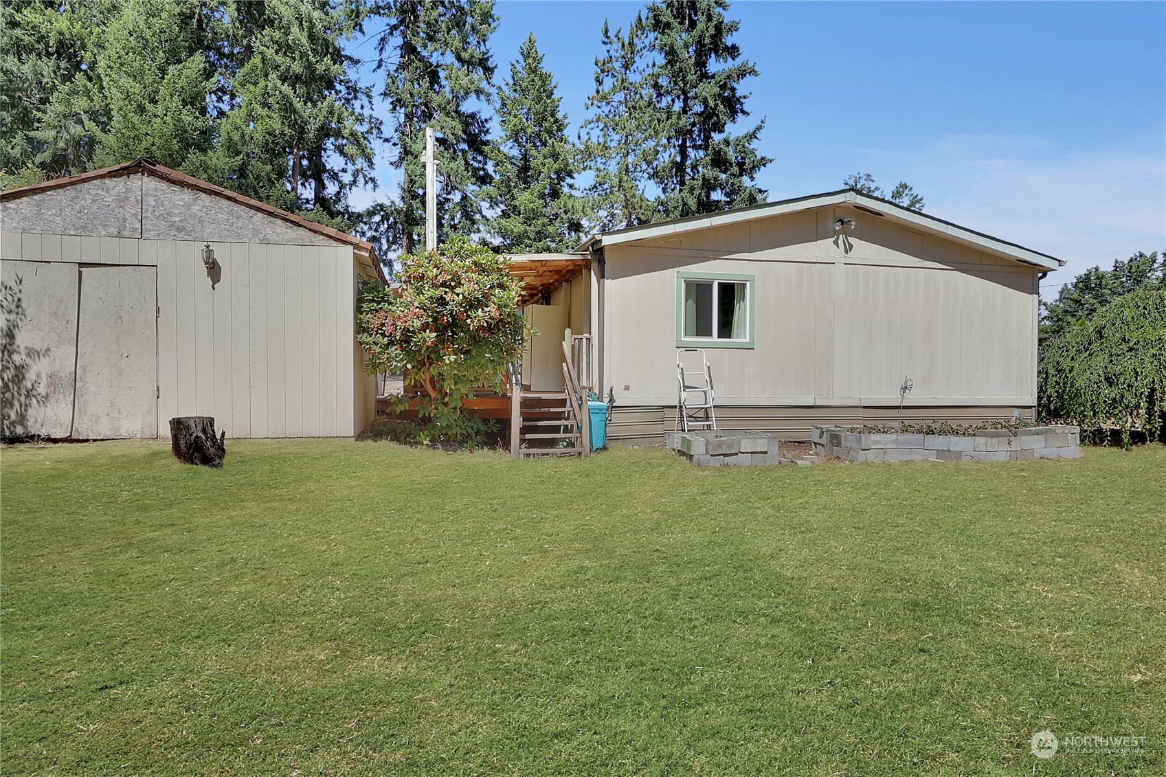 5334 254th Street East Graham, WA 98338 - Photo 23 of 33 a view of backyard with garden