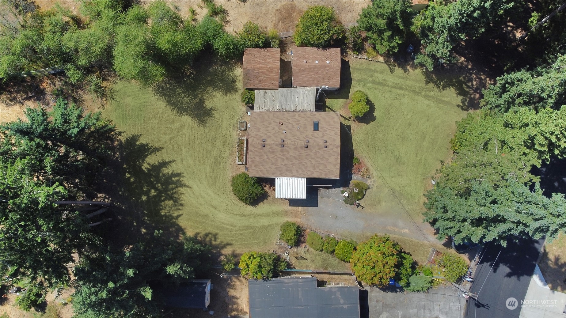5334 254th Street East Graham, WA 98338 - Photo 33 of 33 an aerial view of a house with outdoor space