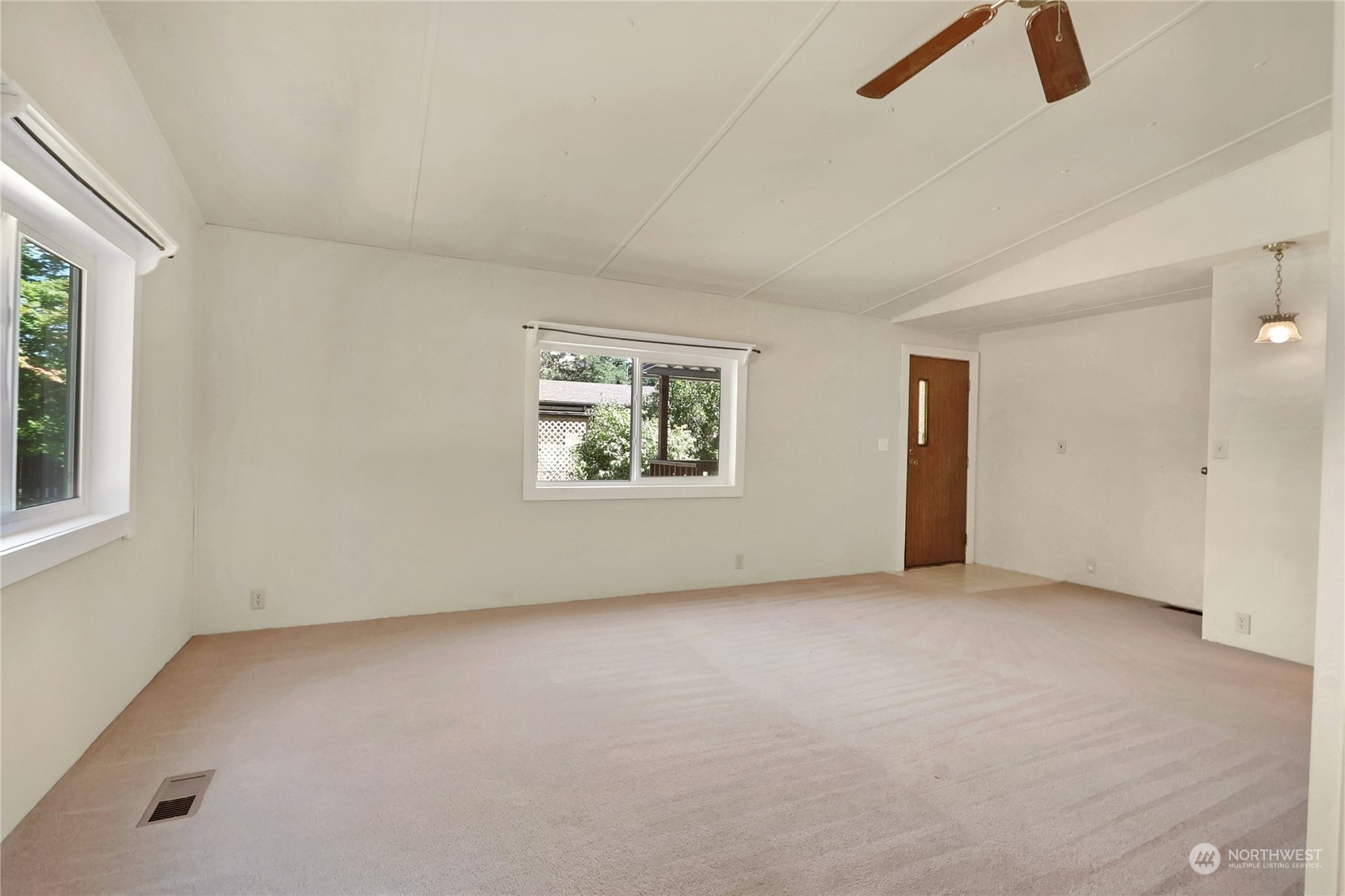 5334 254th Street East Graham, WA 98338 - Photo 5 of 33 an empty room with ceiling fan and window