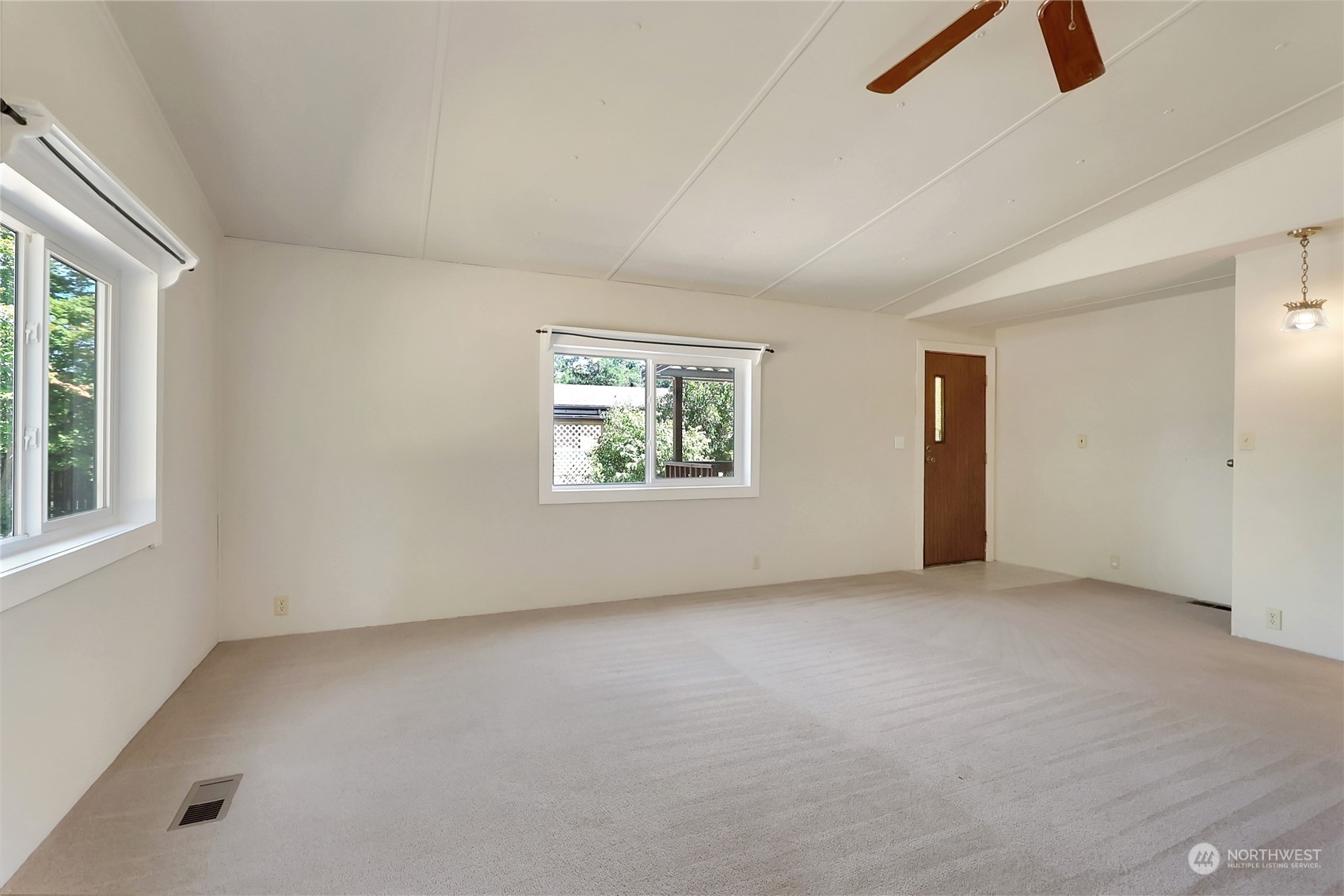 5334 254th Street East Graham, WA 98338 - Photo 6 of 33 an empty room with windows