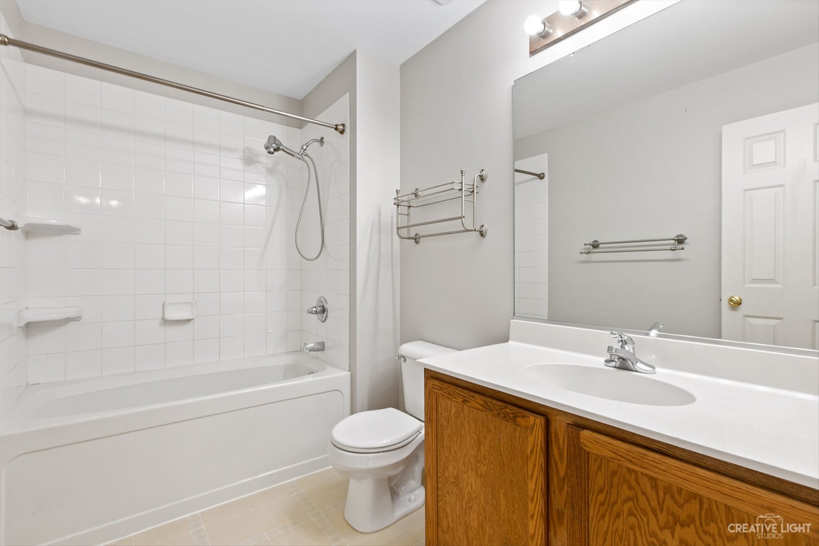511 Declaration Lane Aurora, IL 60502 - Photo 13 of 17 a bathroom with a sink a toilet and shower