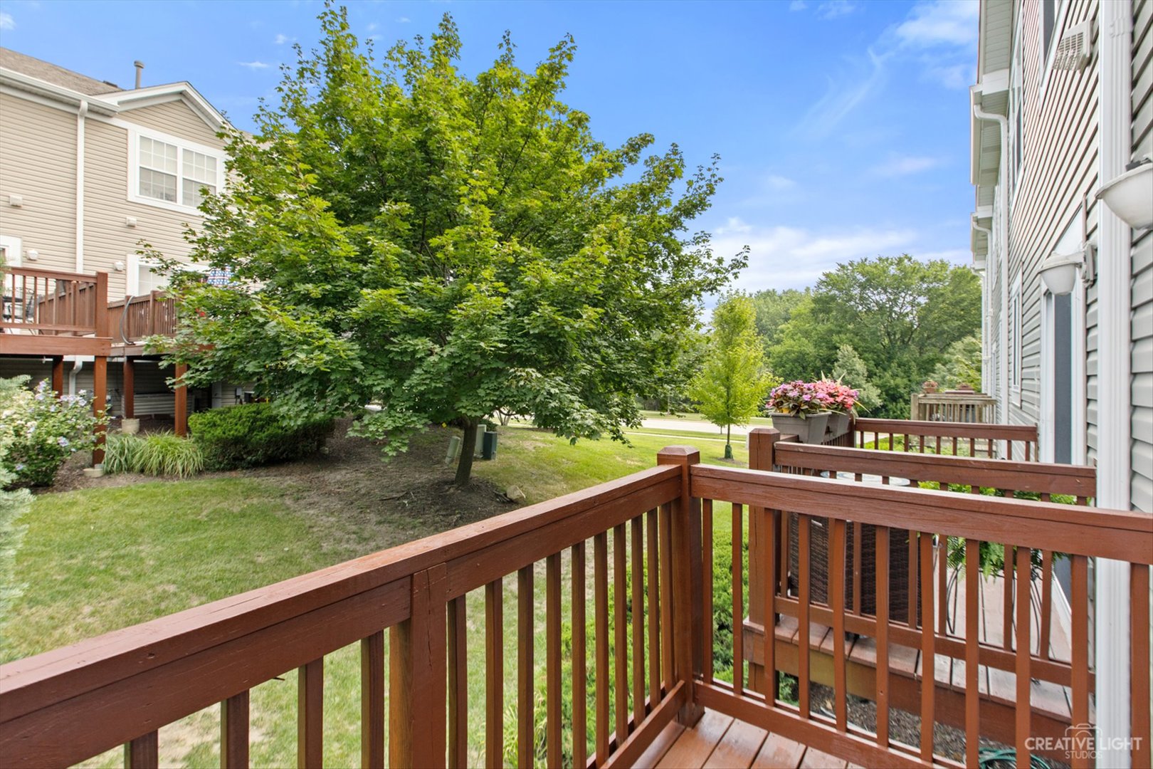 511 Declaration Lane Aurora, IL 60502 - Photo 16 of 17 a view of a balcony with flower plants