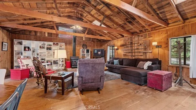 a outdoor living space with furniture and a fireplace