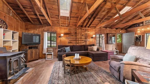 a outdoor living space with furniture and a fireplace