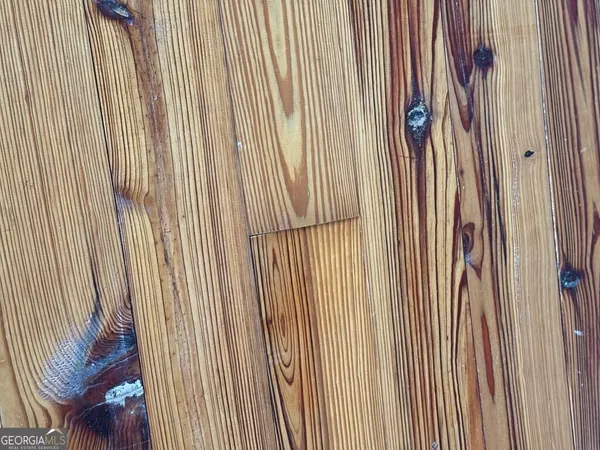 a bathroom with a sink mirror and toilet