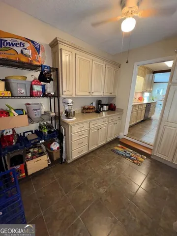 a view of a chairs and table on the wooden floor