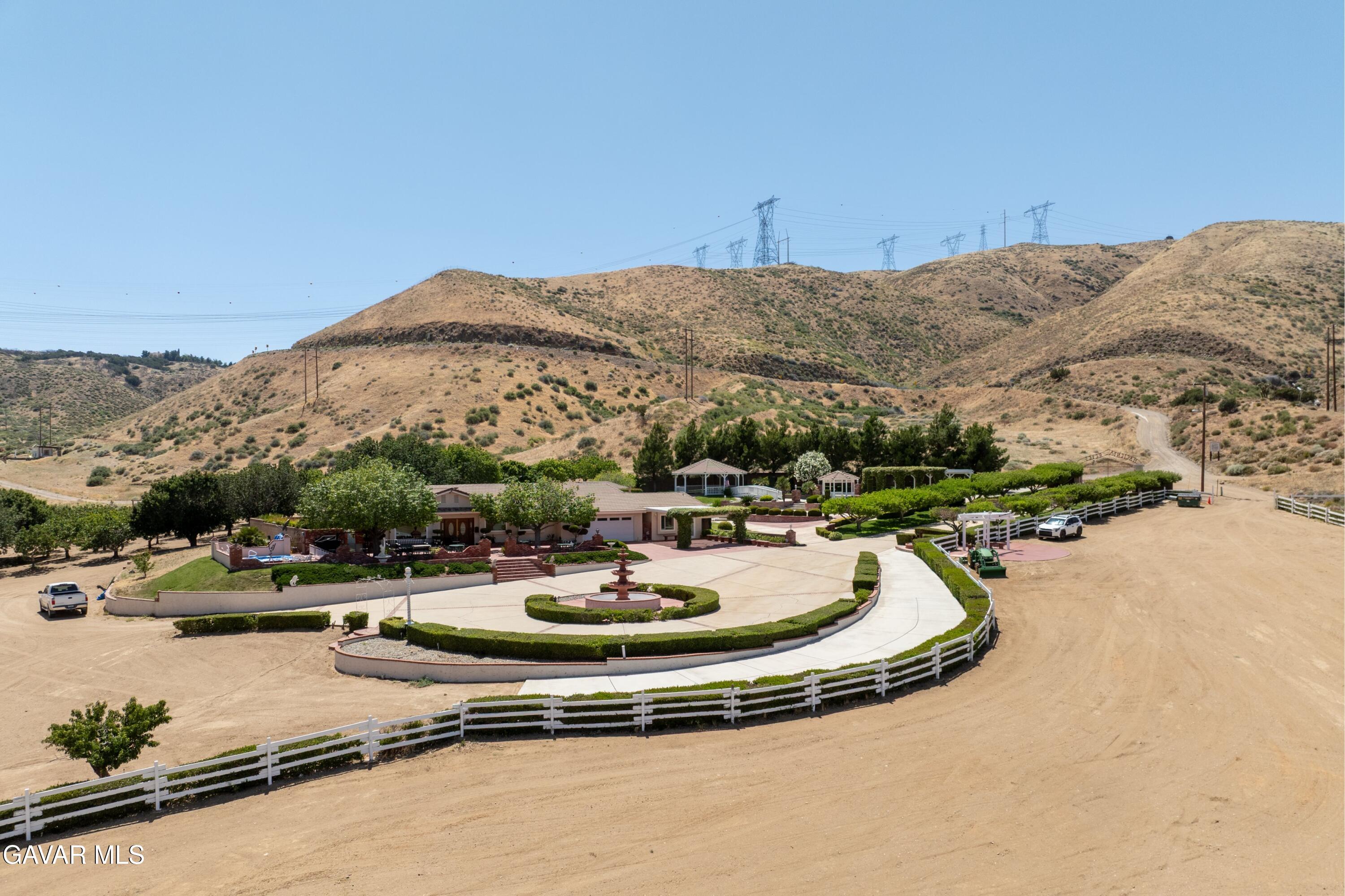 5801 Hacienda Ranch Road Palmdale, CA 93551 - Photo 40 of 69 a view of a swimming pool with a patio
