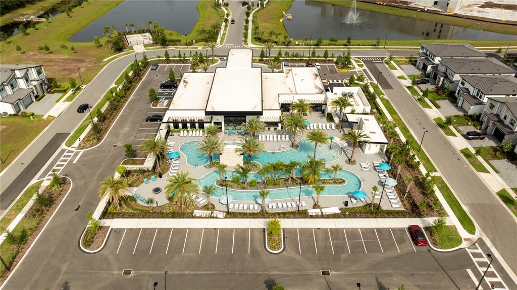 10018 Voyager Way Orlando, FL 32821 - Photo 90 of 100 an aerial view of a residential building with an outdoor space