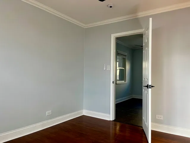 an empty room and wooden floor