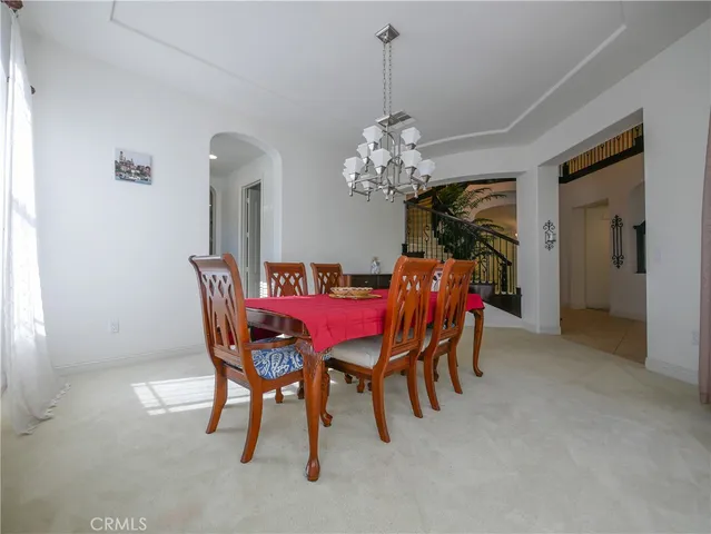 a view of an empty room with windows