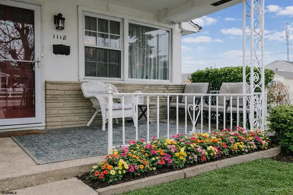 a view of a porch with a bench