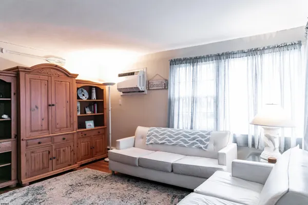 a kitchen with stainless steel appliances a refrigerator and cabinets