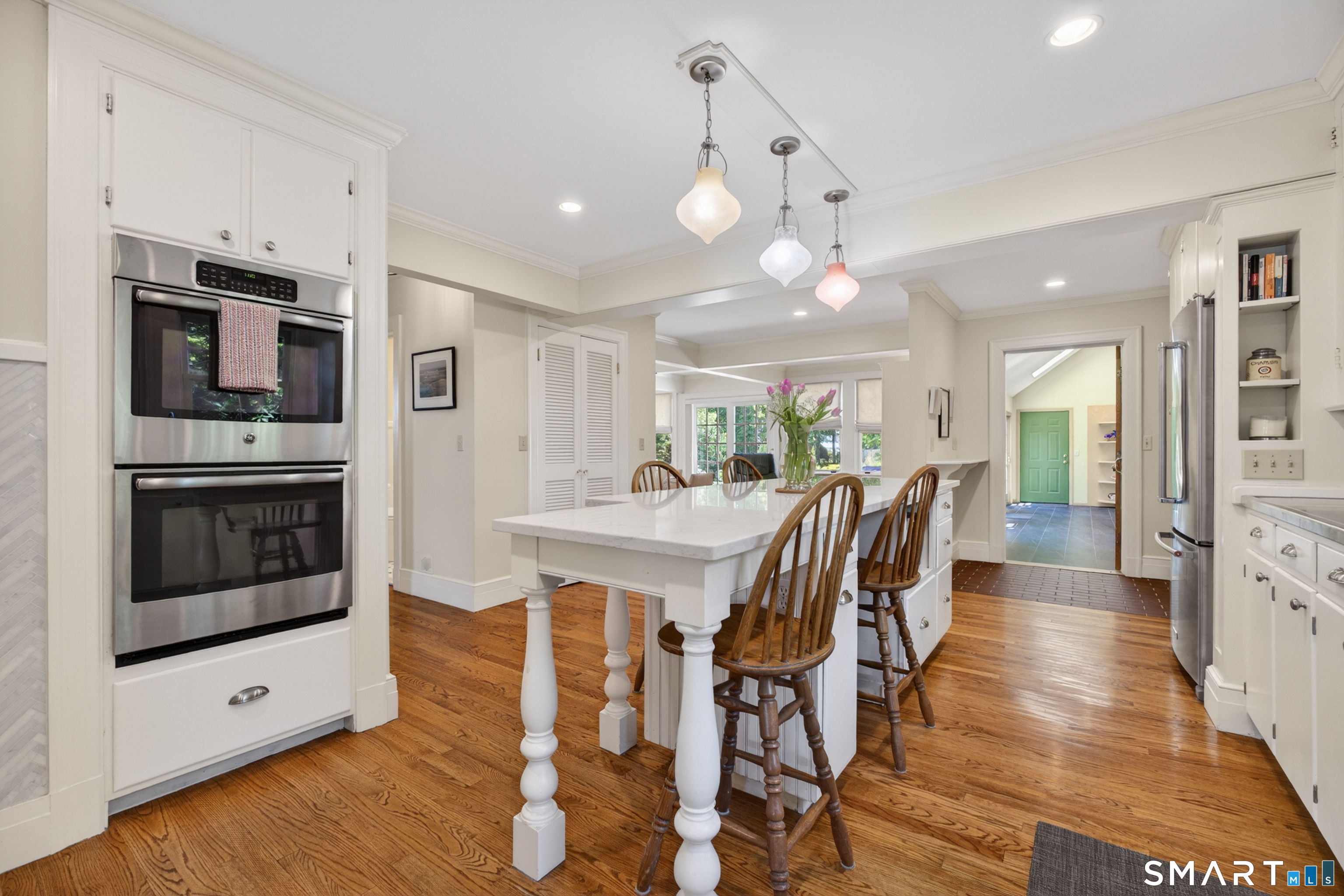 10 Prospect Street Groton, CT 06355 - Photo 11 of 40 a large kitchen with a table and chairs