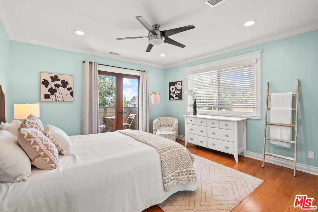 409 Adena Street, Unit 1 Pasadena, CA 91104 - Photo 14 of 26 a bedroom with a bed and a dresser