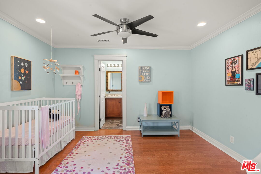 409 Adena Street, Unit 1 Pasadena, CA 91104 - Photo 21 of 26 a bedroom with furniture and a window