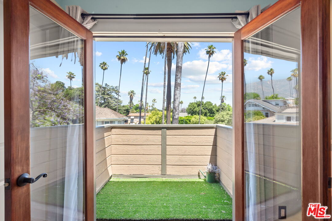 409 Adena Street, Unit 1 Pasadena, CA 91104 - Photo 22 of 26 a view of a back door and a garden view