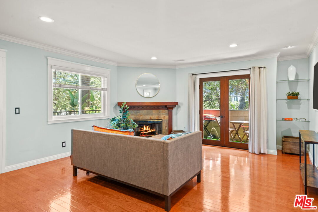 409 Adena Street, Unit 1 Pasadena, CA 91104 - Photo 3 of 26 a living room with furniture and a fireplace