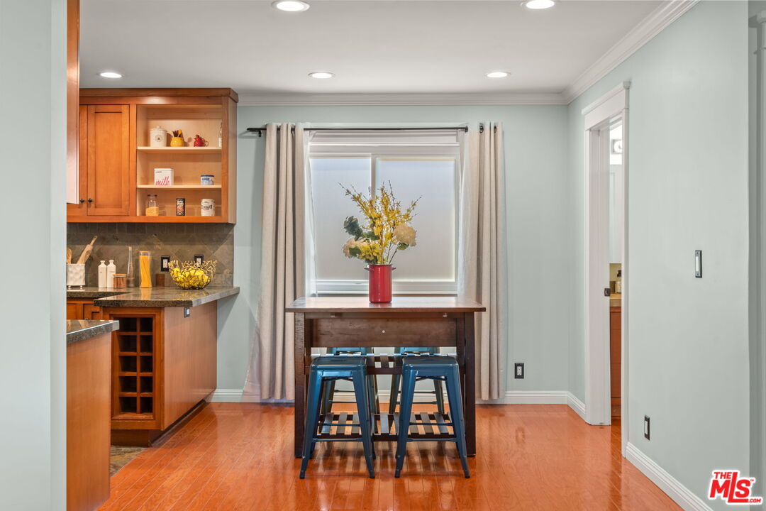 409 Adena Street, Unit 1 Pasadena, CA 91104 - Photo 7 of 26 a workspace with furniture and window