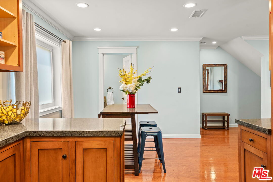 409 Adena Street, Unit 1 Pasadena, CA 91104 - Photo 10 of 26 a view of a room with furniture and wooden floor
