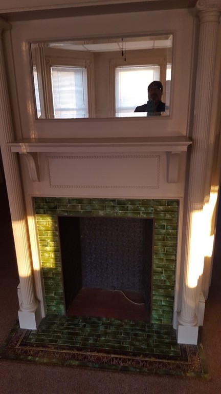33 Cambridge Street Fall River, MA 02721 - Photo 6 of 10 a view of fireplace and window