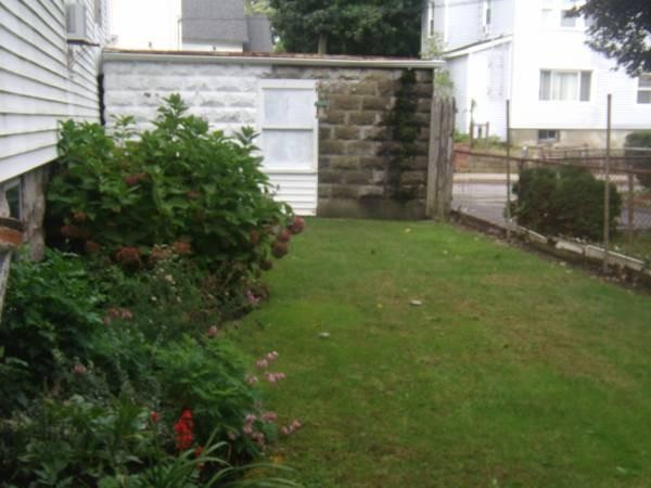 33 Cambridge Street Fall River, MA 02721 - Photo 8 of 10 a view of a backyard with plants