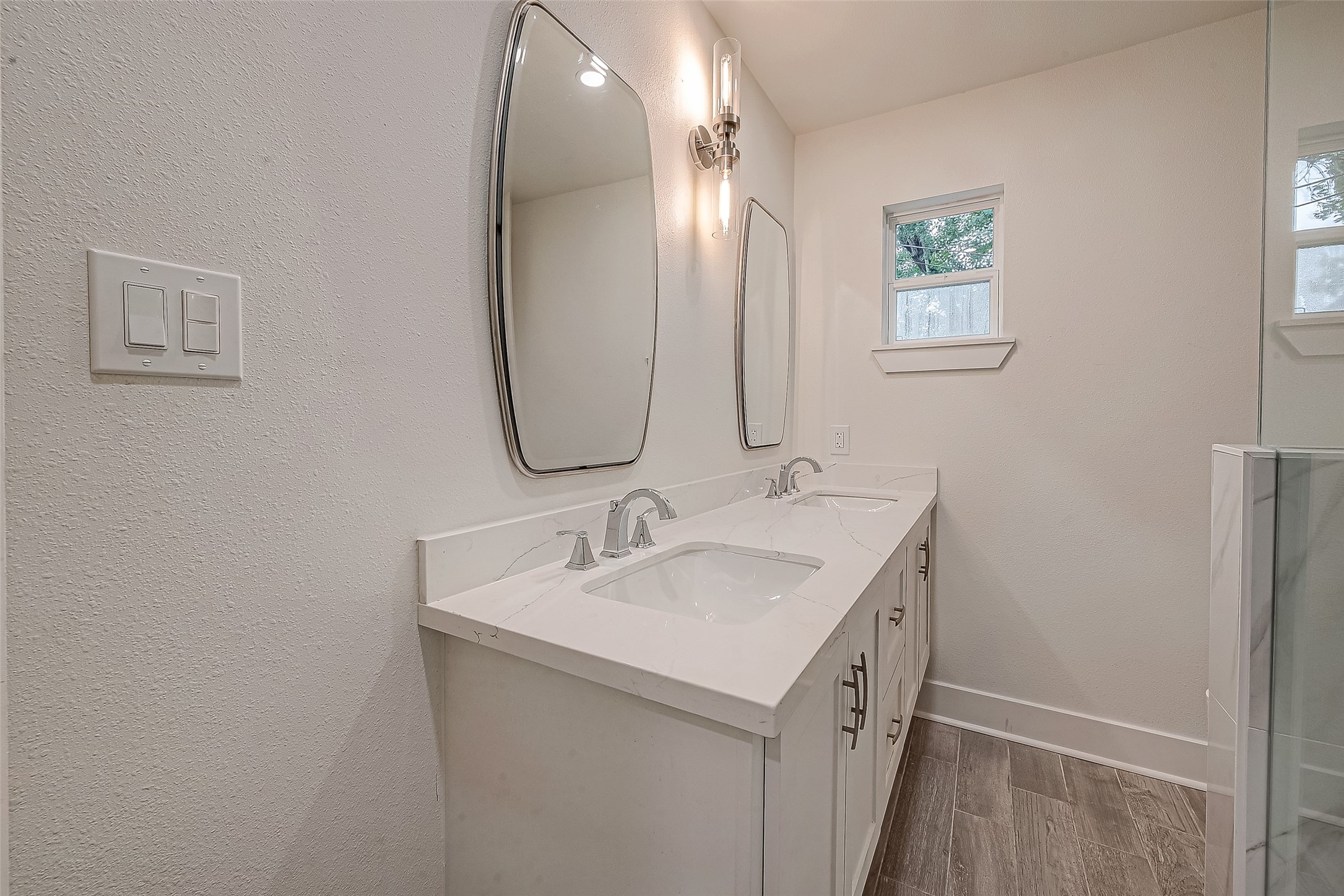 5703 Belmark Street Houston, TX 77033 - Photo 21 of 43 a bathroom with a sink and a mirror