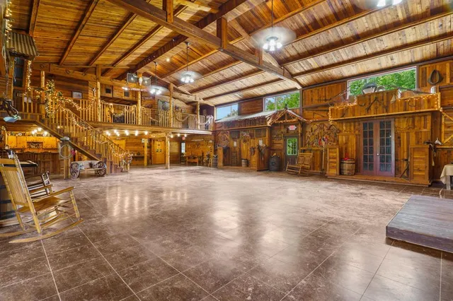 a view of a room with wooden walls