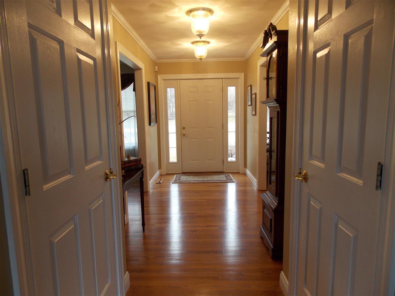 4373 Ridgeview Lane Byron, IL 61010 - Photo 13 of 22 a view of gallery with wooden floor