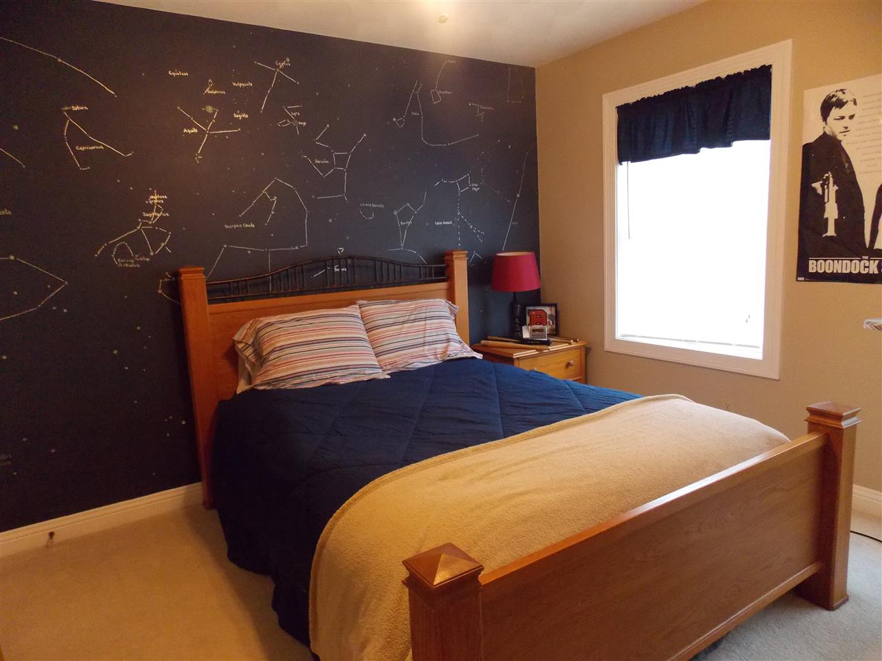 4373 Ridgeview Lane Byron, IL 61010 - Photo 17 of 22 a bedroom with a bed and window