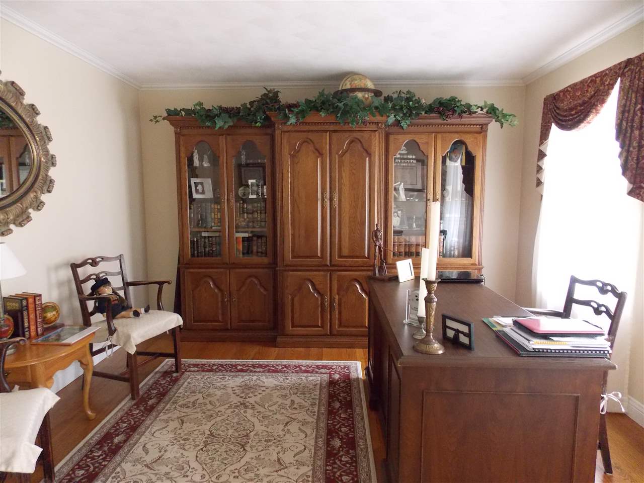 4373 Ridgeview Lane Byron, IL 61010 - Photo 8 of 22 a living room with furniture a rug and a painting