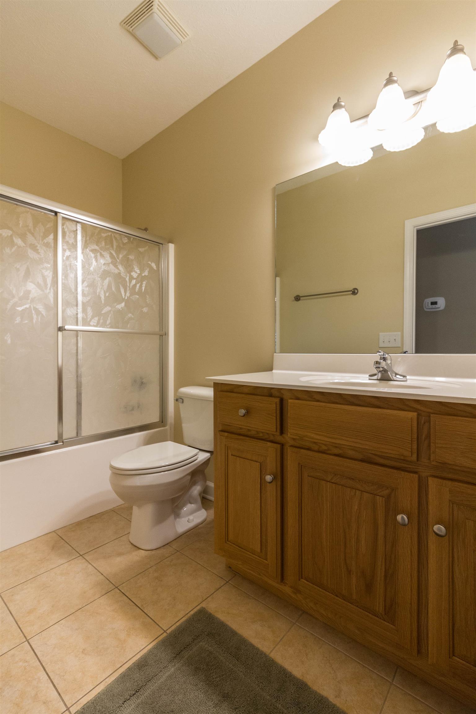 6019 Ebenezer Road Greenbrier, TN 37073 - Photo 17 of 25 a bathroom with a sink a toilet and shower