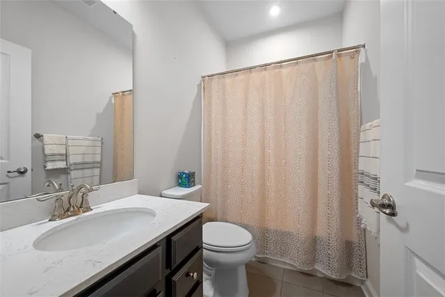 a bathroom with a sink and toilet